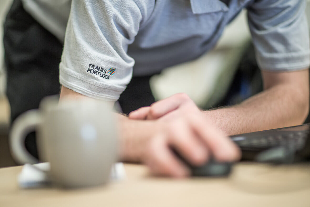 person using mouse on computer